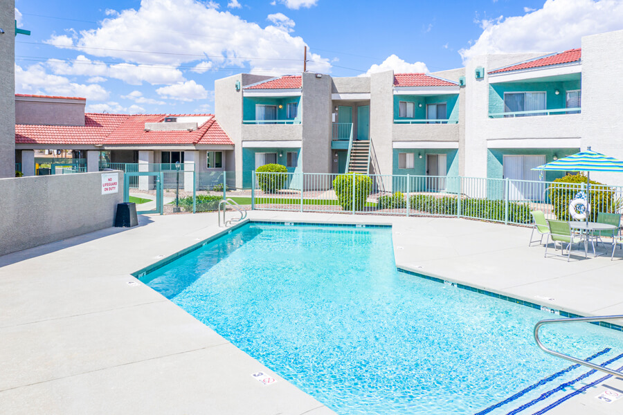 The Perry Apartments in Phoenix | Swimming Pool with Apartment building in background